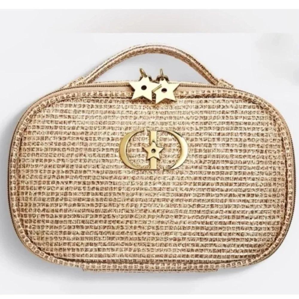 Dior 2025 Limited Holiday Edition cosmetic pouch in a gold, sparkly material.